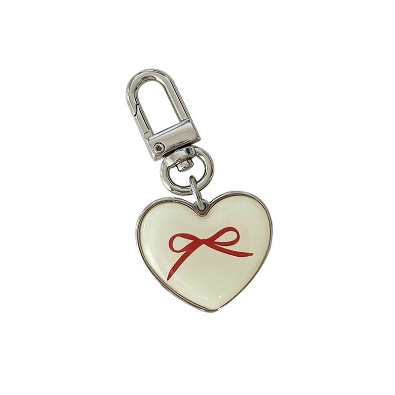 allthesamestudio(オールザセイムスタジオ)の「ribbon heart epoxy keyring(ivory)(Toys/Key Holders)」