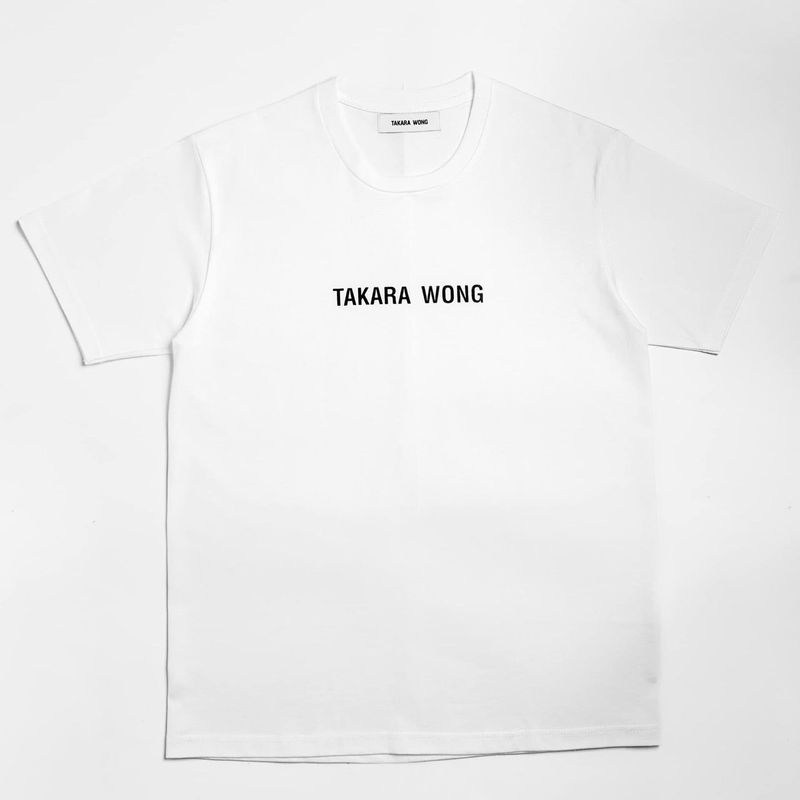 TAKARA WONG（タカラウォン）の「WHITE LOGO TSHIRT（Tops）」