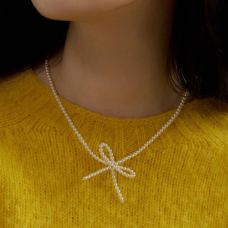 geegee(ジジ)の「little pearl ribbon necklace(Accessories)」