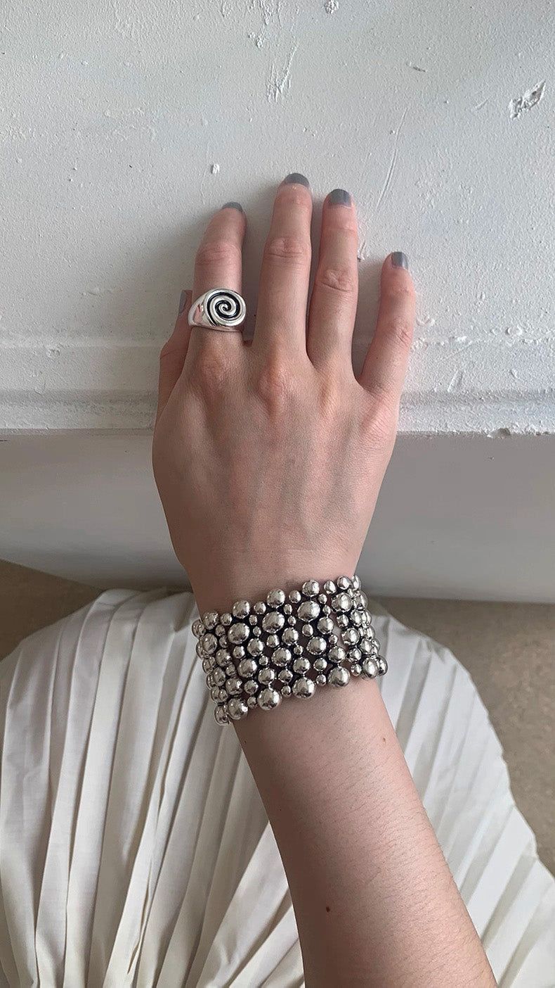 Flat spiral bold ring