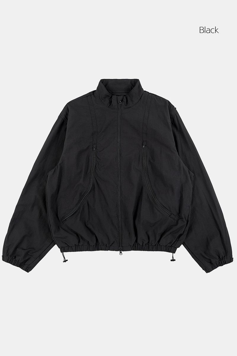 Multi curved line zip-up jumper