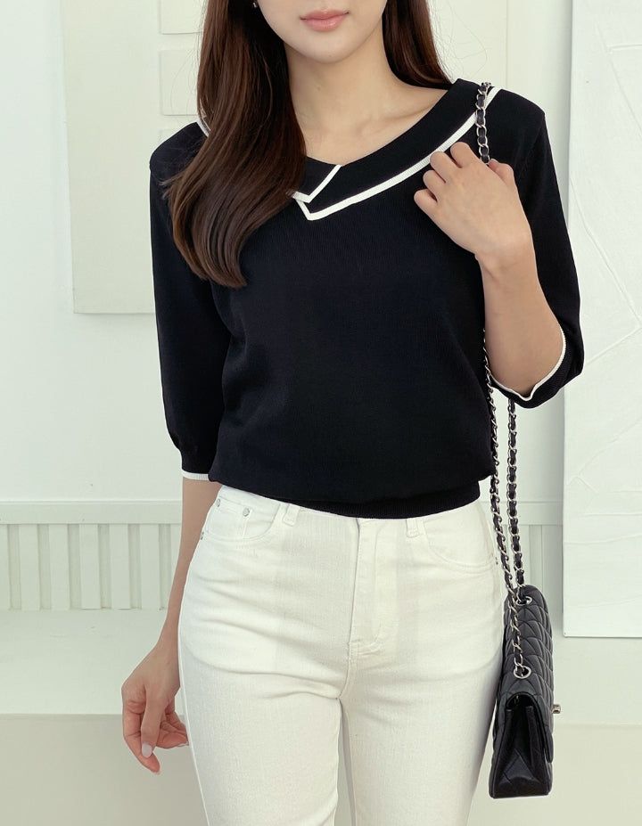 iam mari（アイアム マリ）の「Roven Color Matching Collar Half-Length Knit（Tops）」