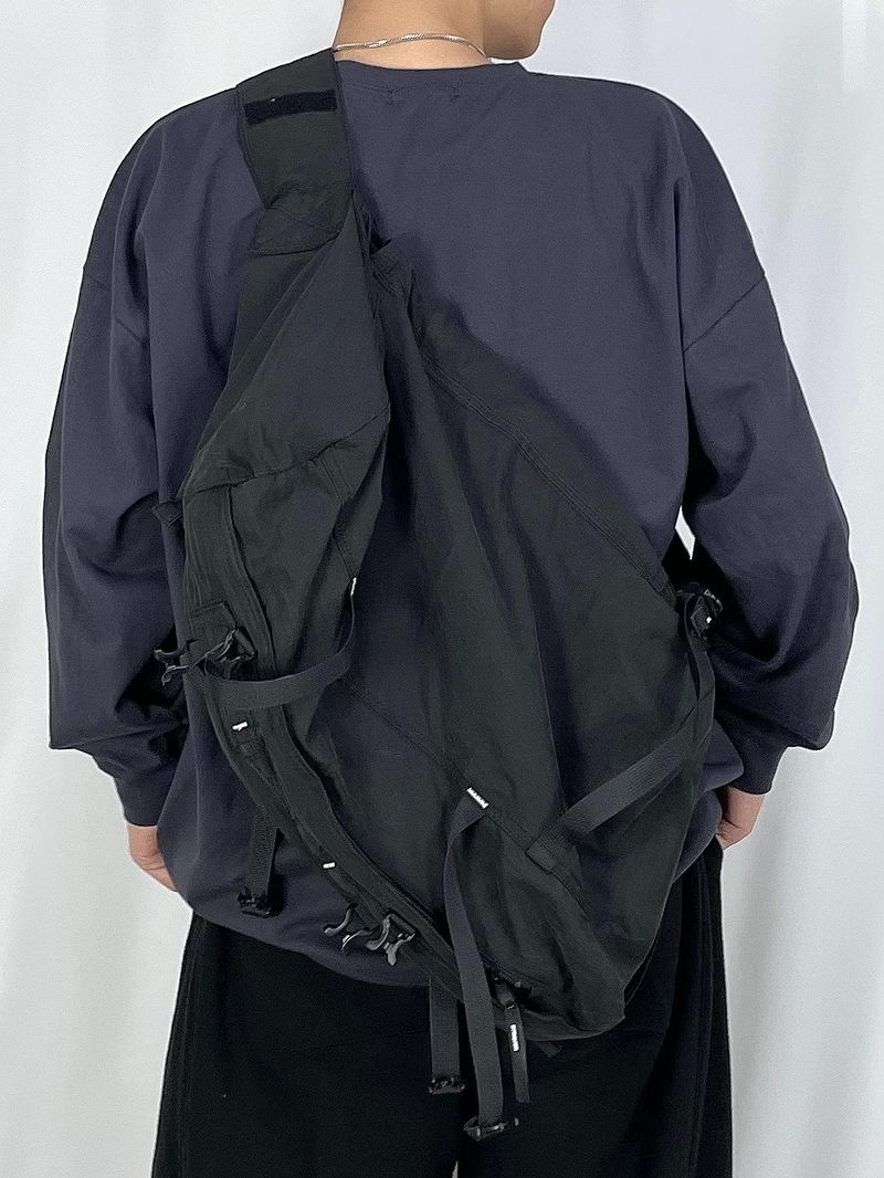 Velcro over sling-bag