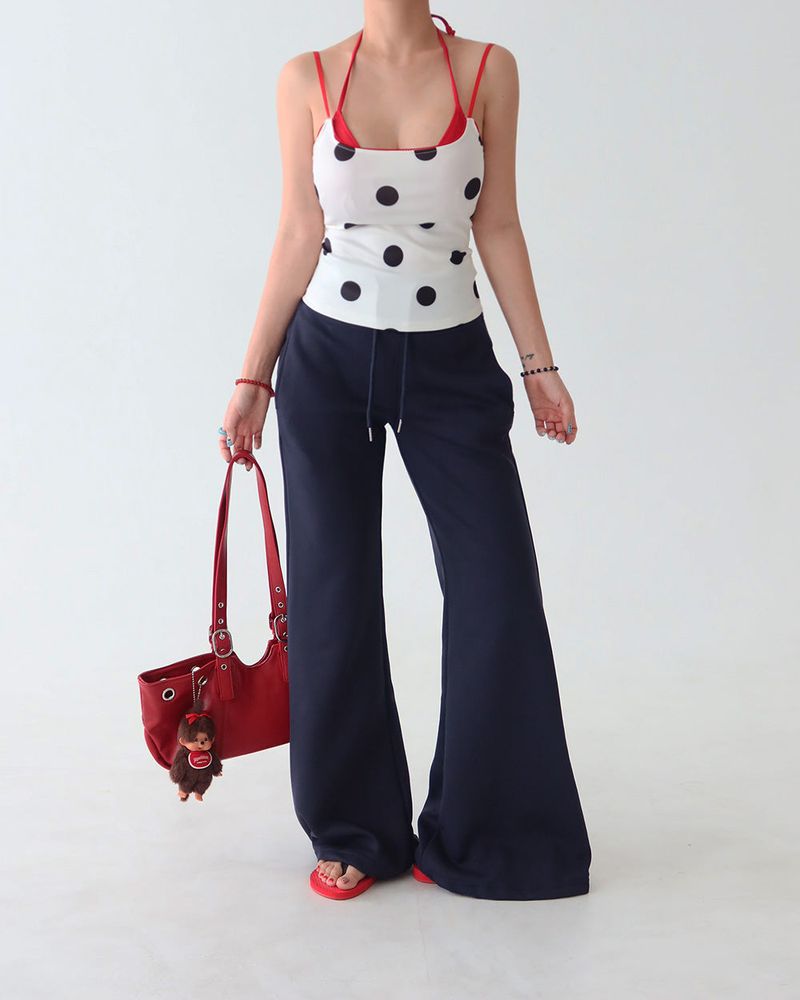 Red colored royal dot sleeveless shirt