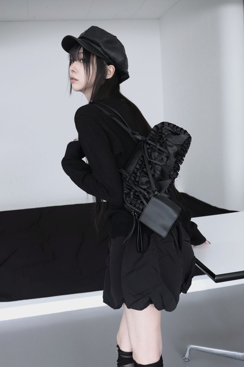 black leather ribbon bag