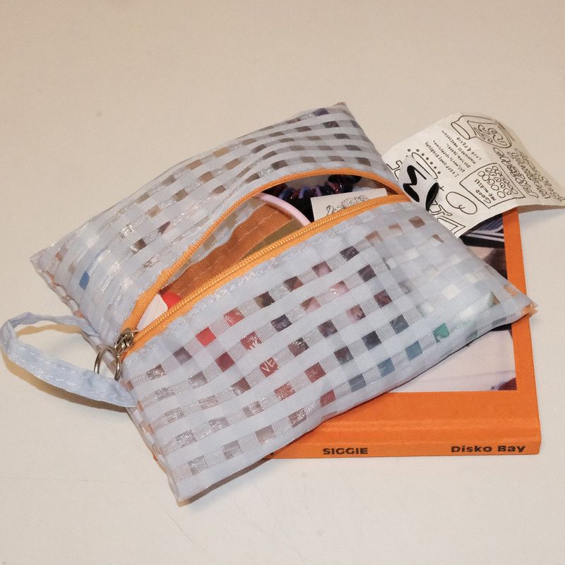 minmin（ミンミン）の「Glossy Cross Stripes Basic Pouch (Sky Orange)（Smartphone Accessories）」