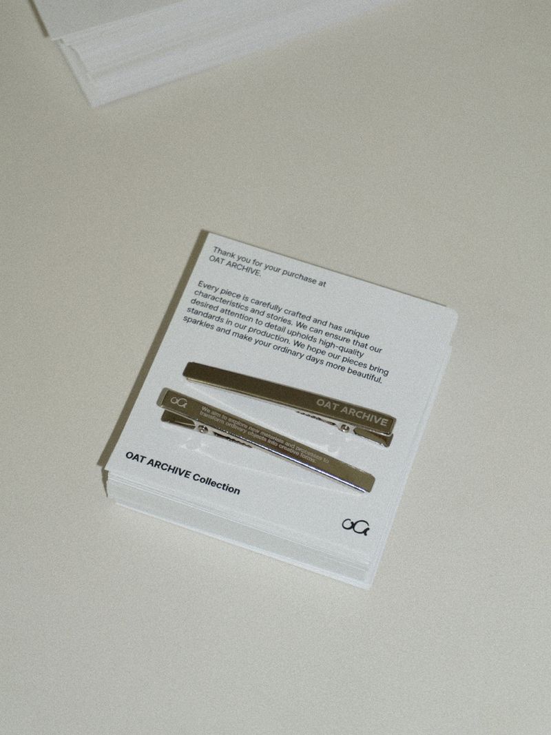 Silver logo hair pin