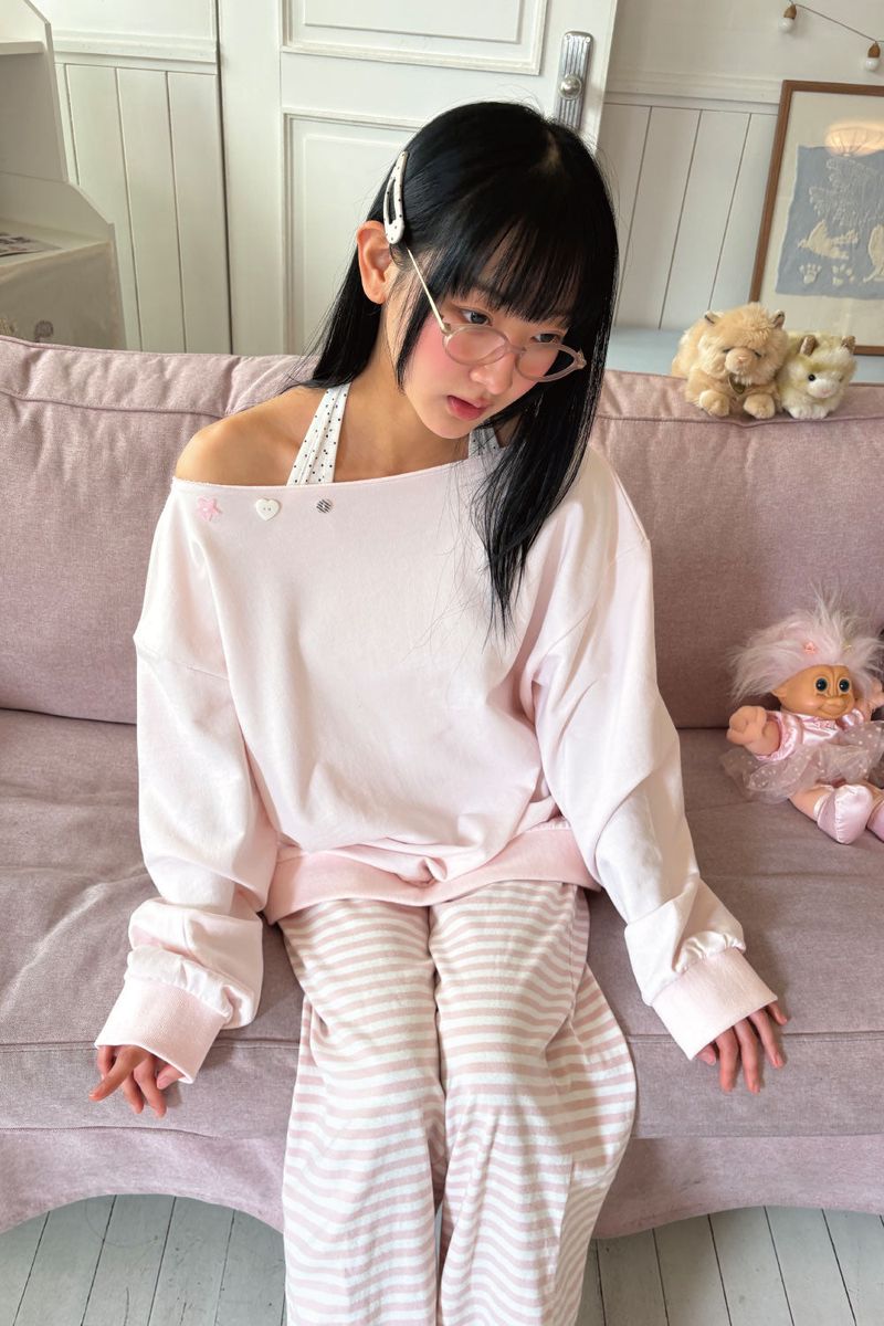 SHAKIRI（シャキリ）の「[BITTE DOSAN X SHAKIRI] MELODY OFF SHOULDER TOP (PINK)（Tops）」