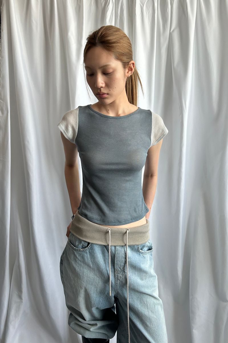 MDNC（エムディーエヌシー）の「ツートーン ラグランT[CHARCOAL]（トップス）」