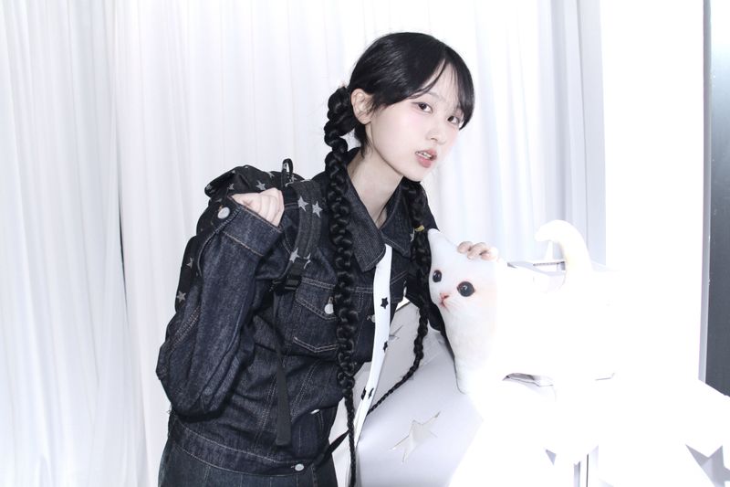 star pattern denim pocket backpack
