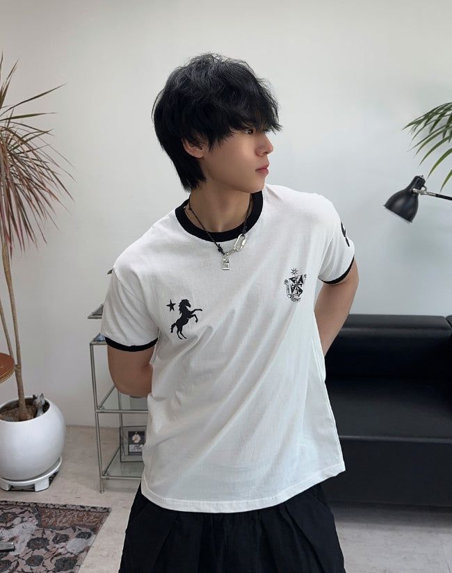 SATIIIZ（サティーズ）の「Tran 87 Emblem Ringer Short Sleeve T-shirt（Tops）」