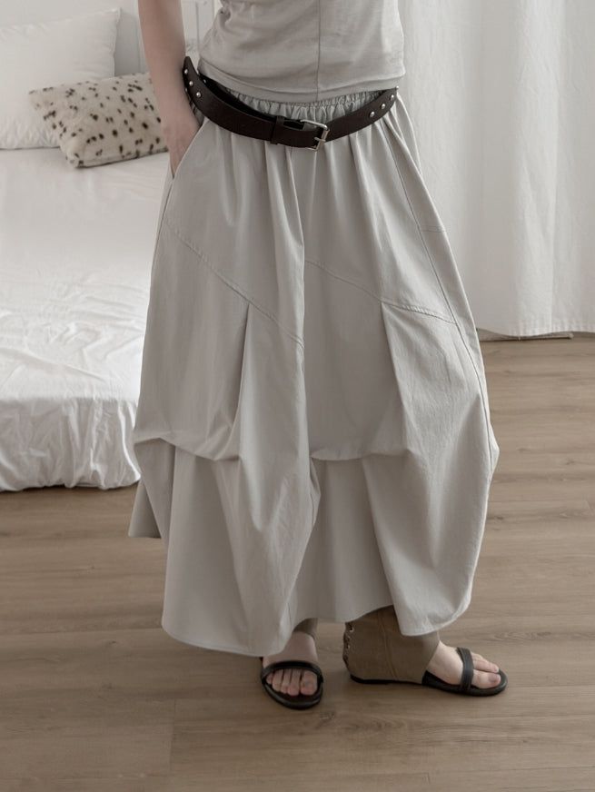 mnem（ムネム）の「Tura Pintuck Long Skirt（Skirts）」