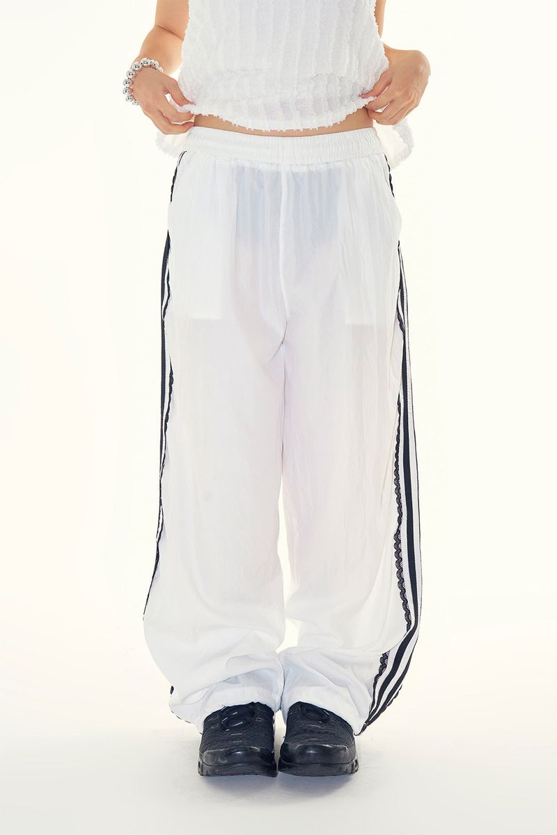 Raucohouse（ラウコハウス）の「Frill lace track pants（Pants）」