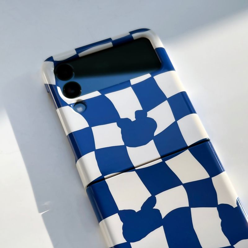 moorugi(モールジ)の「Checkerboard Blue Zflip Case(Hats)」