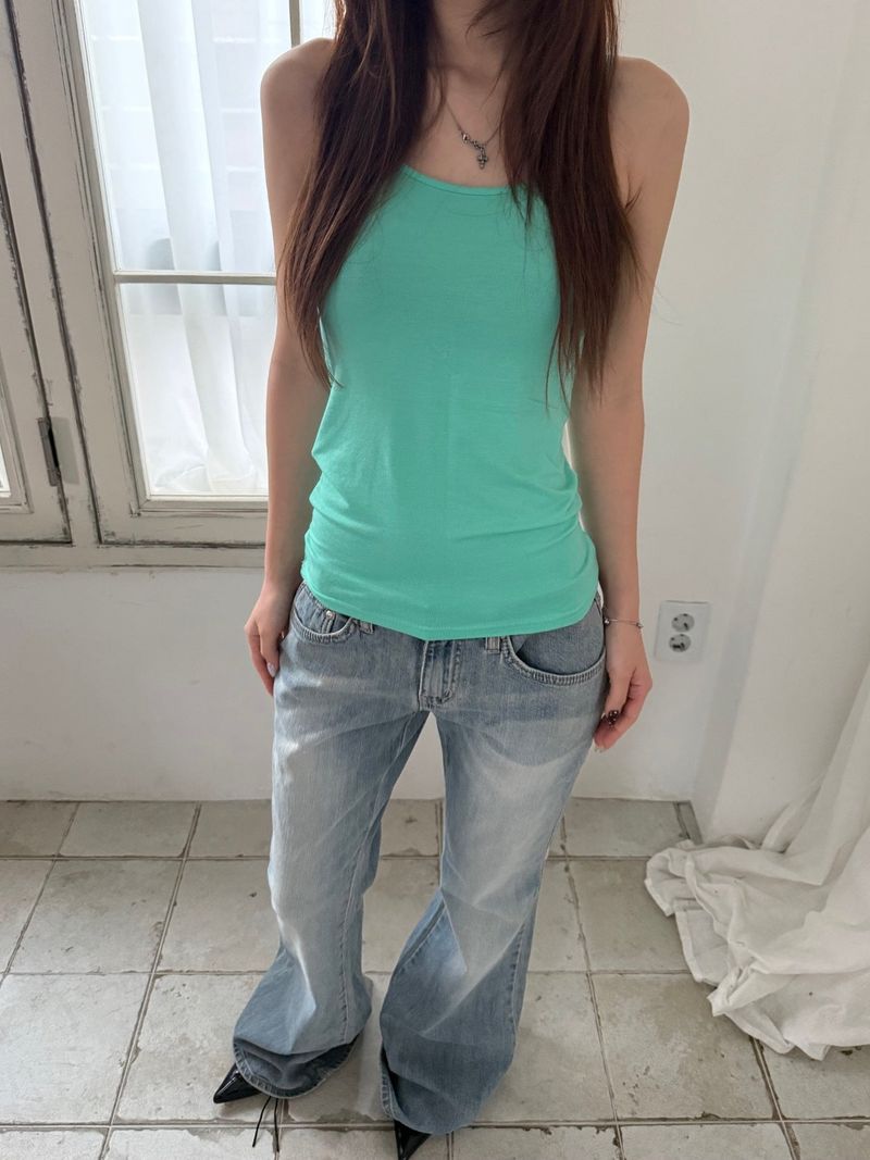 Slipover（スリップオーバー）の「Layered sleeveless（Tops）」