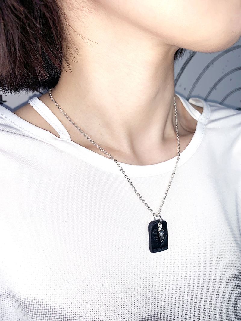 HEART BONE TARGET PENDANT