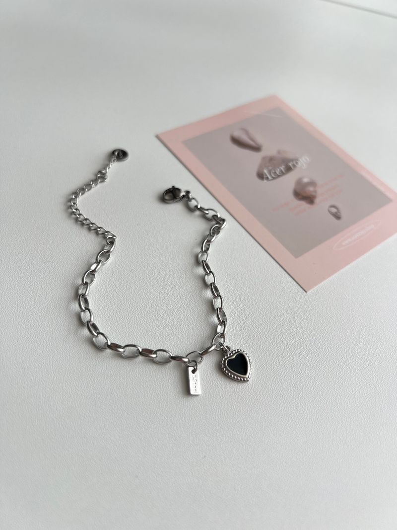 Acer rojo(アセルロジョ)の「pib hip chic black heart surgical chain bold layered bracelet(Accessories)」