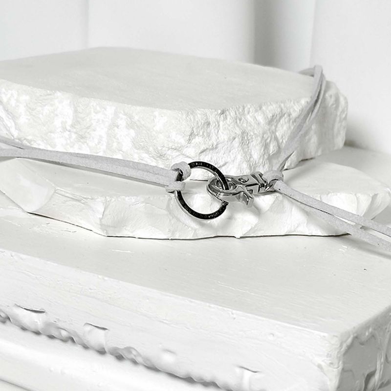 BLESSED BULLET（ブレスドブレット）の「Suede string lettering necklace_grey（Accessories）」