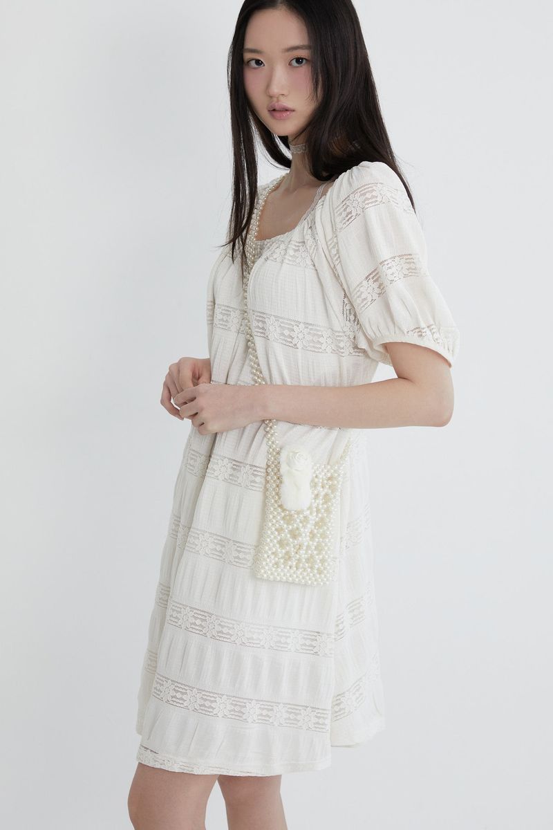 Innermuseum(インナーミュージアム)の「Flower crochet shirring dress (IVORY)(Dresses)」