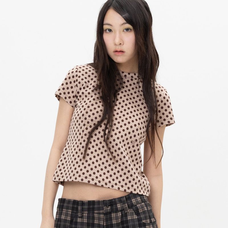 WEBHOUSE（ウェブハウス）の「Twister Star Angel Tee - Dot Brown（Tops）」