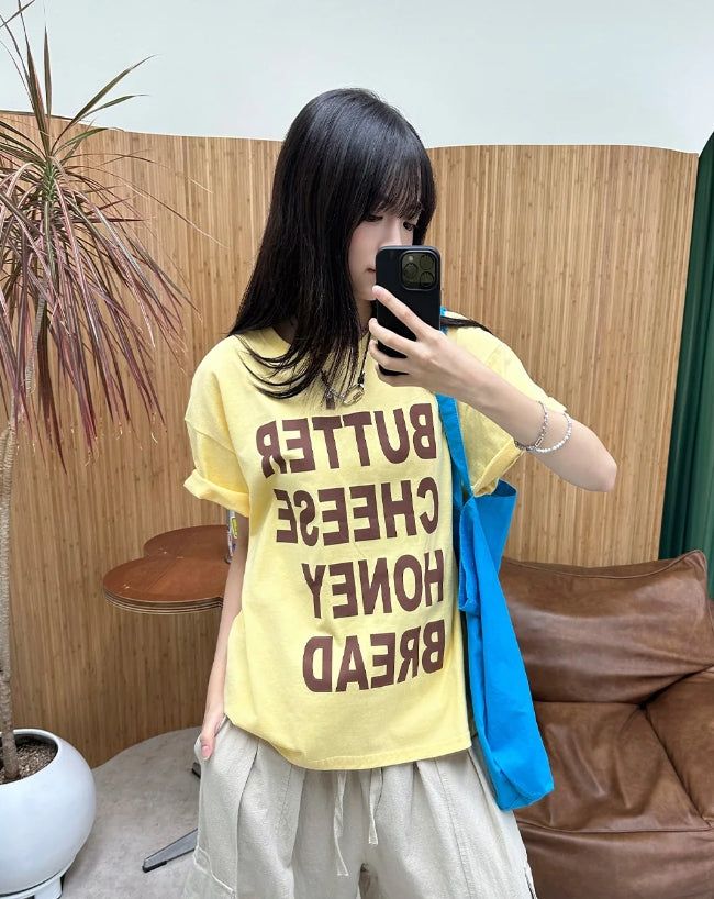 SATIIIZ（サティーズ）の「Ruben Color Word Short Sleeve T-shirt（Tops）」