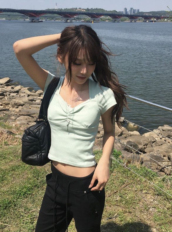 anyonemore（エニーワンモアー）の「26SS★ [MADE/more BASIC] シスンパンチングハートネックシャーリングキャップスリーブ半袖Tシャツ（トップス）」