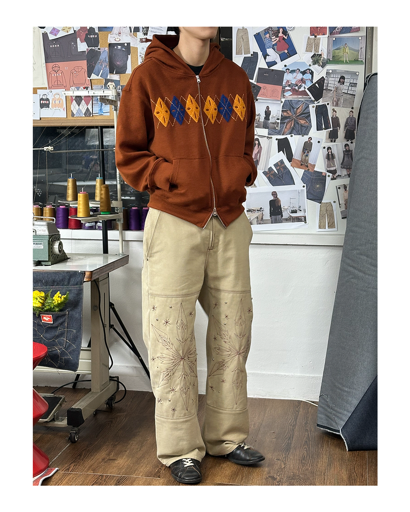 GGOTT（ゴット）の「[Hand-Made「007」] スノーフレークスタッズパンツ_ベージュ＆バーガンディ（パンツ）」