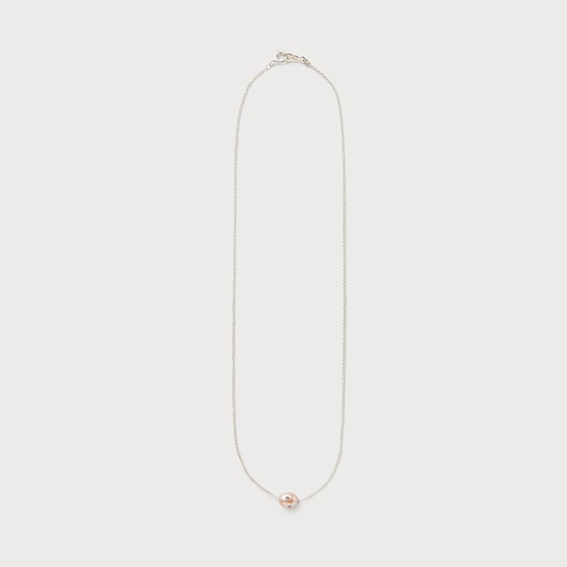 PEARLSONATE（パーソネイト）の「ポルカドッツネックレス　ピーチ（アクセサリー）」