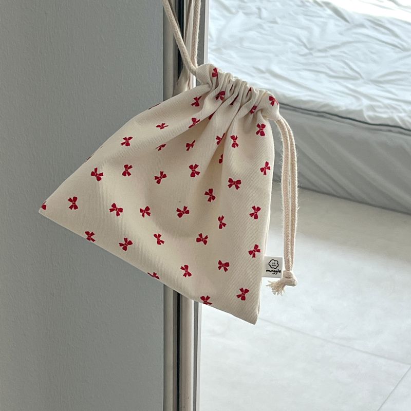 RED RIBBON STRING POUCH