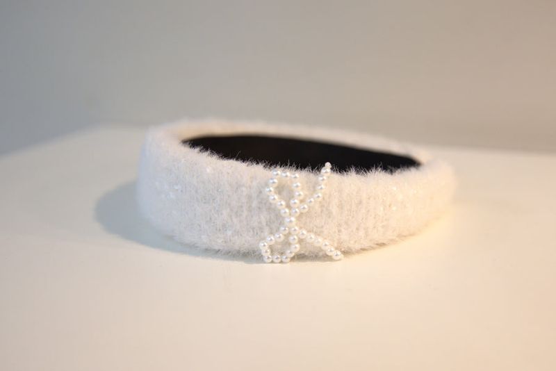 cattline(カトリーヌ)の「Ribbon Pearl Fur Hairband Ivory(Hair Accessories)」