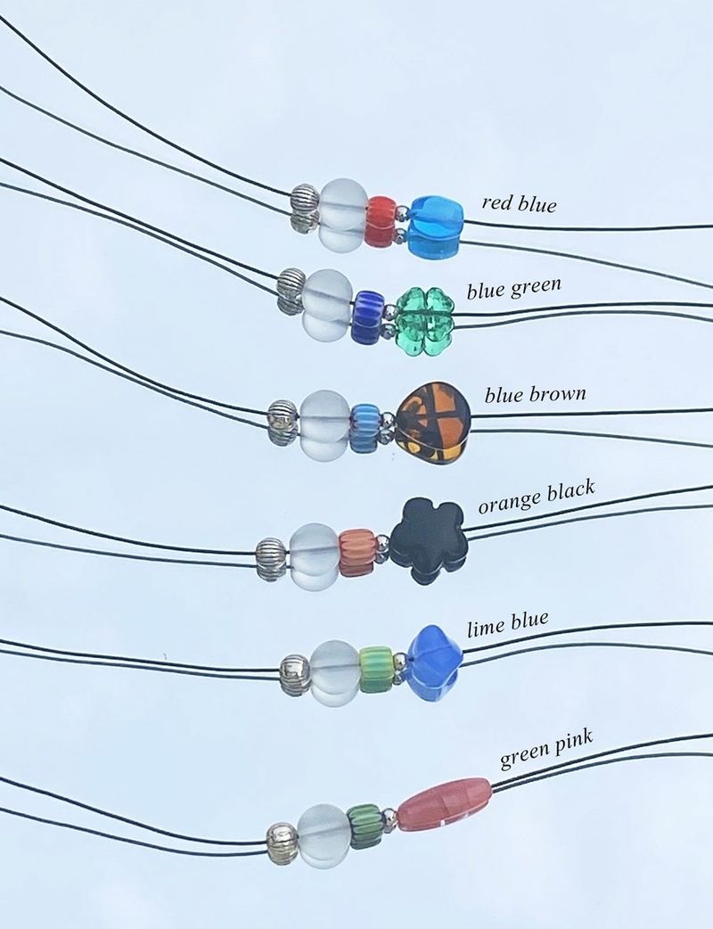 RUNDS(ランド)の「point beads necklace (6color)(Accessories)」