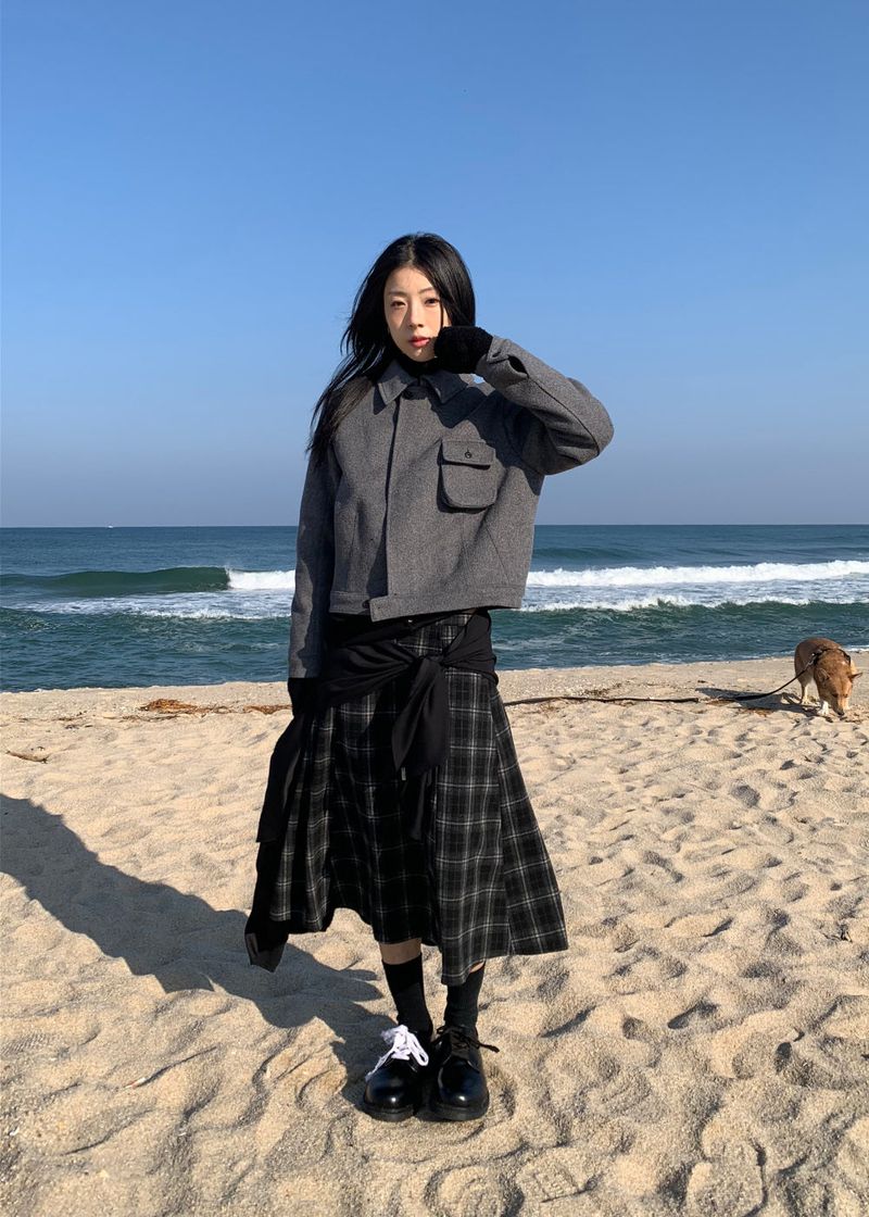 A BLACK CHECK SKIRT