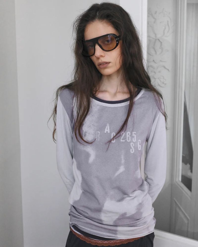 PORTERNA（ポルテナ）の「26SS★ ローカットブラーディグラフィック長袖Tシャツ（トップス）」