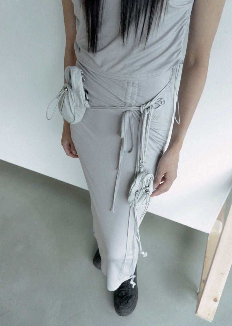 WOOHWA(ウファ)の「DESERT SHIRRING SLIT SK GREY(Skirts)」