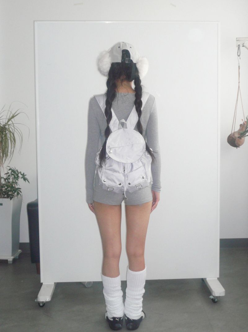 Gray round pocket backpack