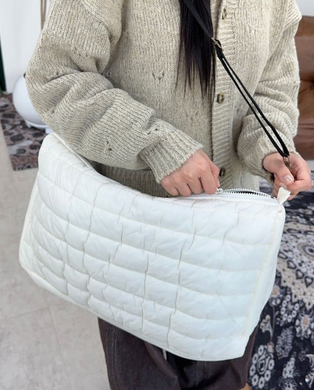 Reven padded crossbody bag