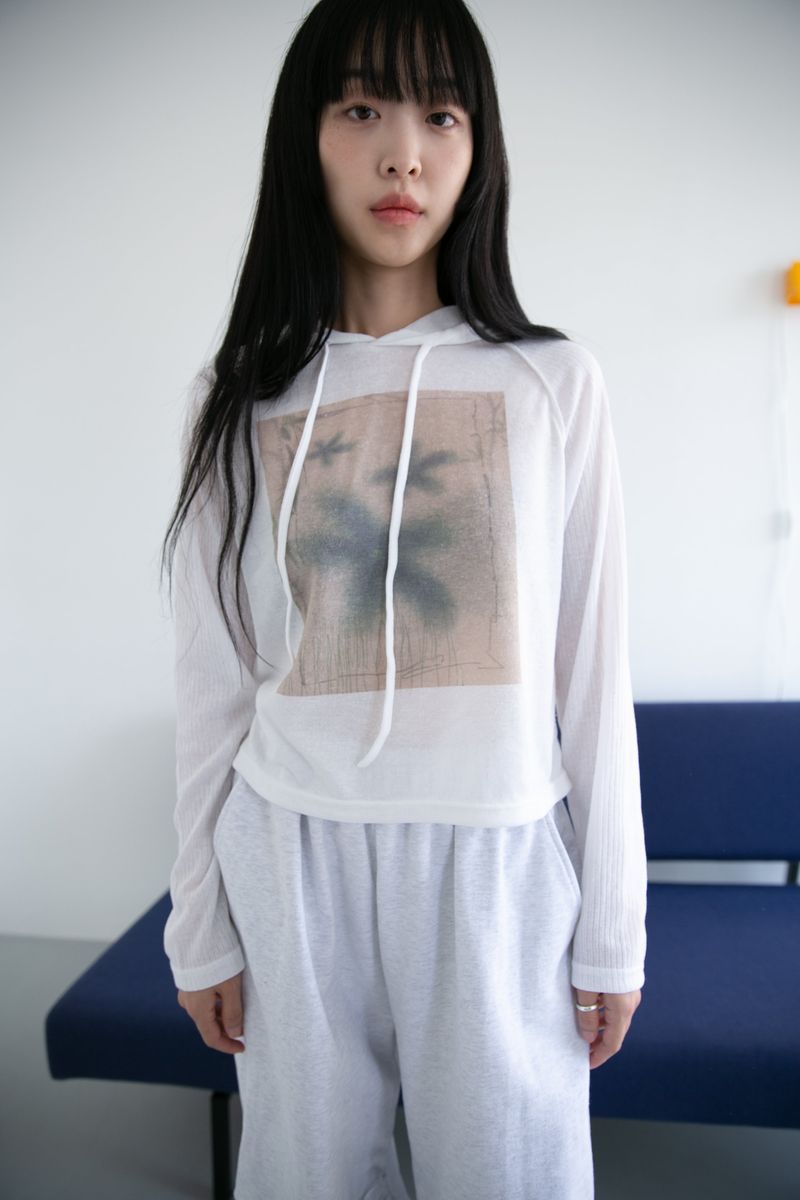 omoosoohy（オムスヒ）の「printing golgi sleeve hood top(3colors)（Tops）」