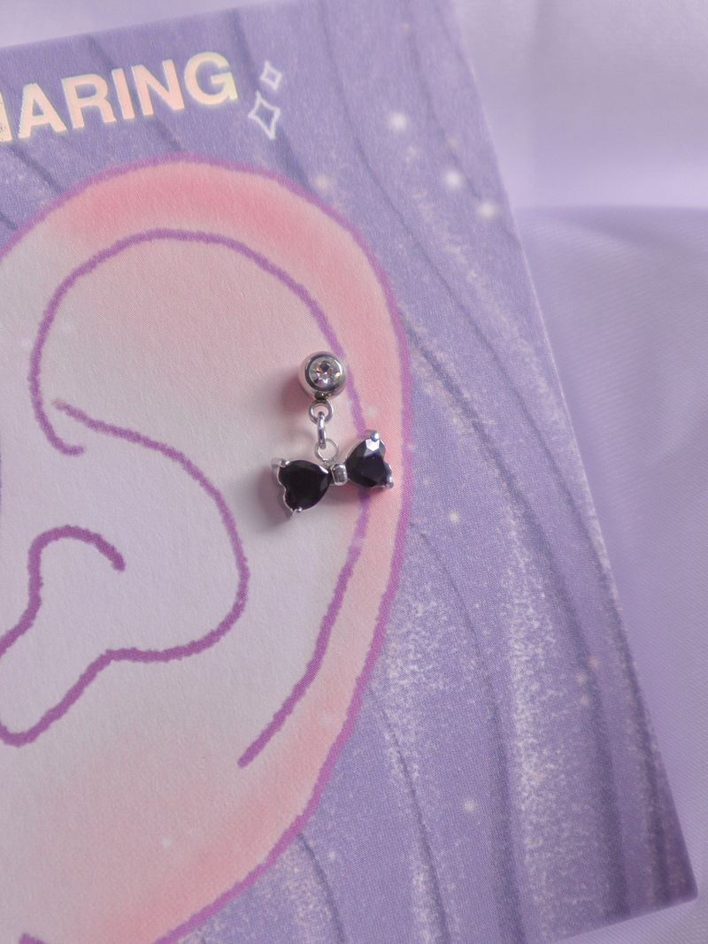 Surgical steel black ribbon piercing