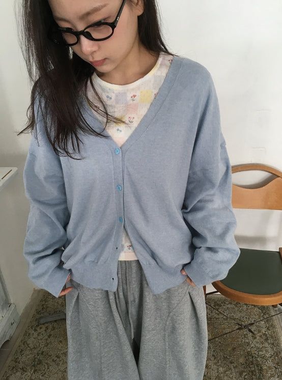 BAON（バオン）の「ネルドカラーマッチングオーバーVネックカーディガン（トップス）」