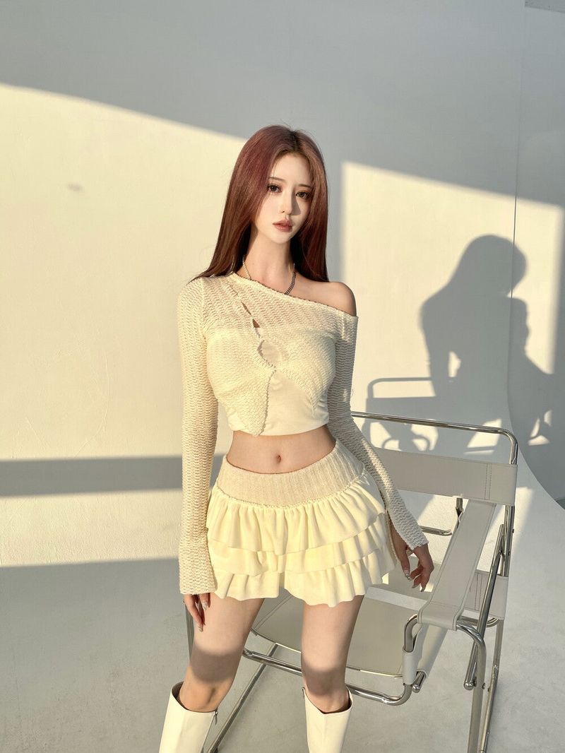 Seow（ソウ）の「 Demi unbal cut-out crop knit (3color)（Tops）」