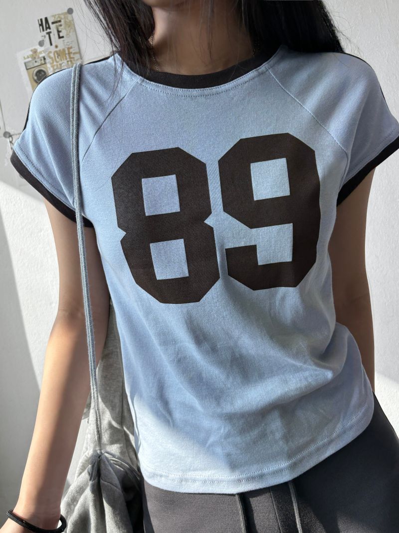 CCORTTI(コルッティ)の「Cheery Number Raglan Crop Tee 3color(Tops)」