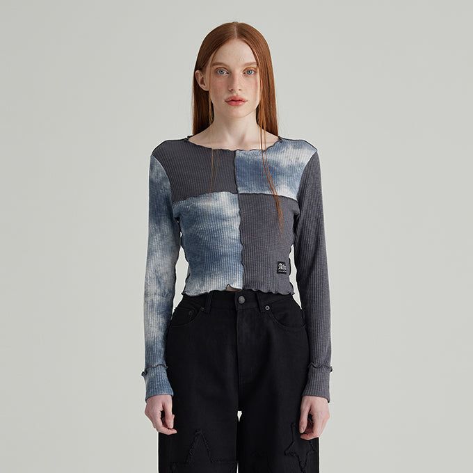 ANDTHEOTHER(アンドジアザー)の「NAVY TIE-DYE BLOCK MIX CROP LONG SLEEVES T-SHIRT(Tops)」