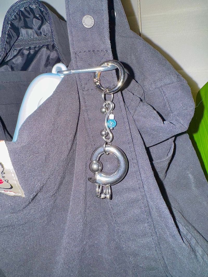 Curved pierce keychain