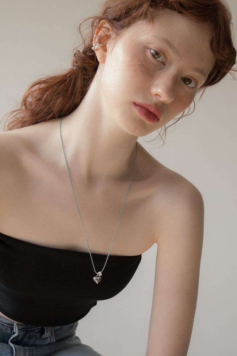 Heart point melange string necklace