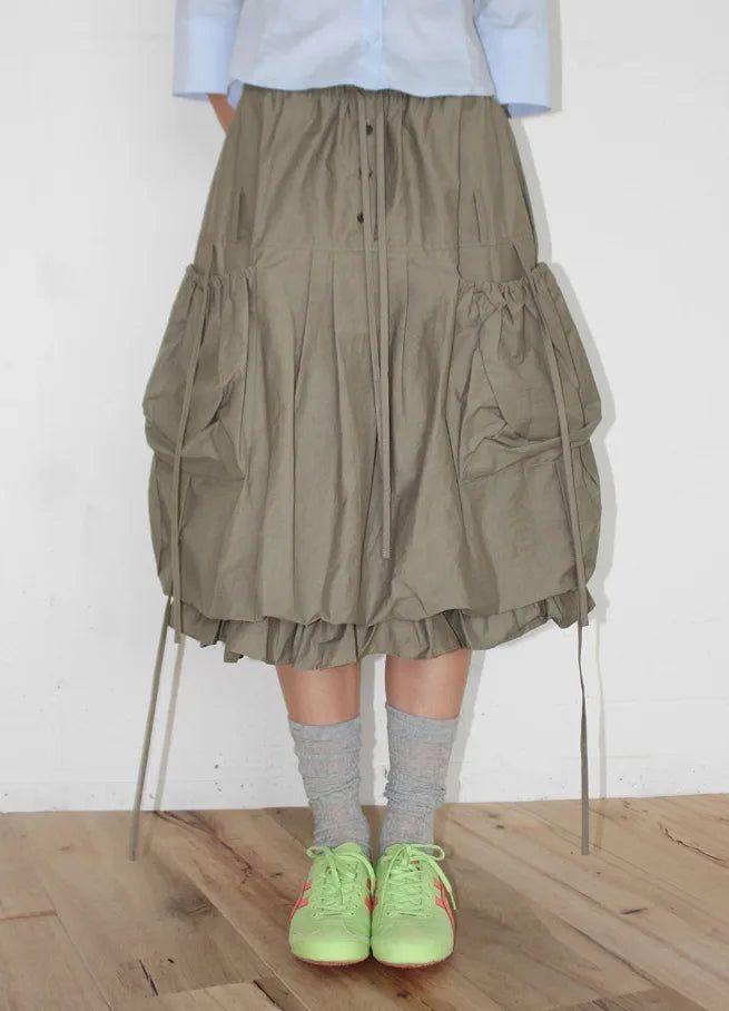AAKE(アケ)の「CARGO BALLOON MIDI SKIRT(Skirts)」