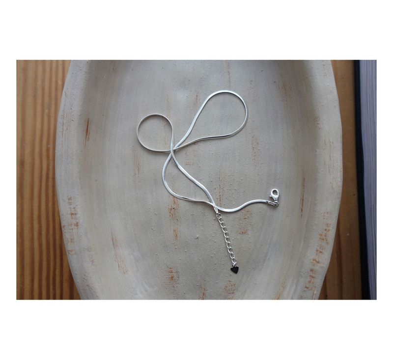 silhouette snake necklace