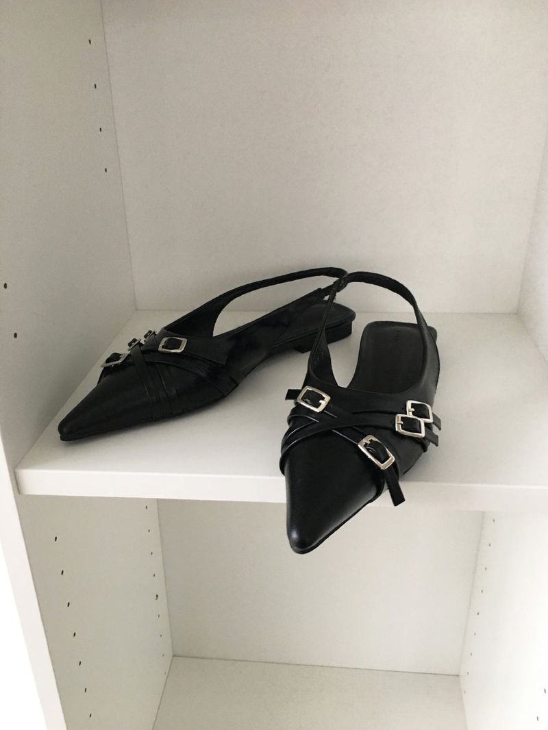 Twist belt slingback flat