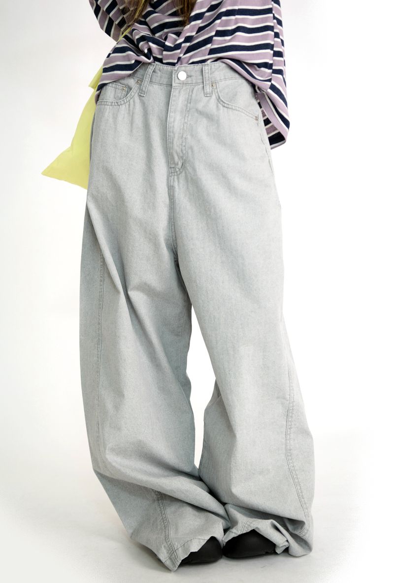 over wide gray pants