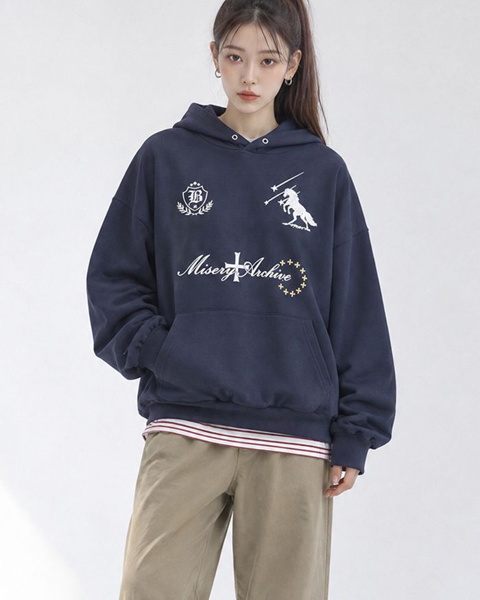 KIXI（キッシー）の「(UNISEX) スターフォール グラフィック フーディ（トップス）」