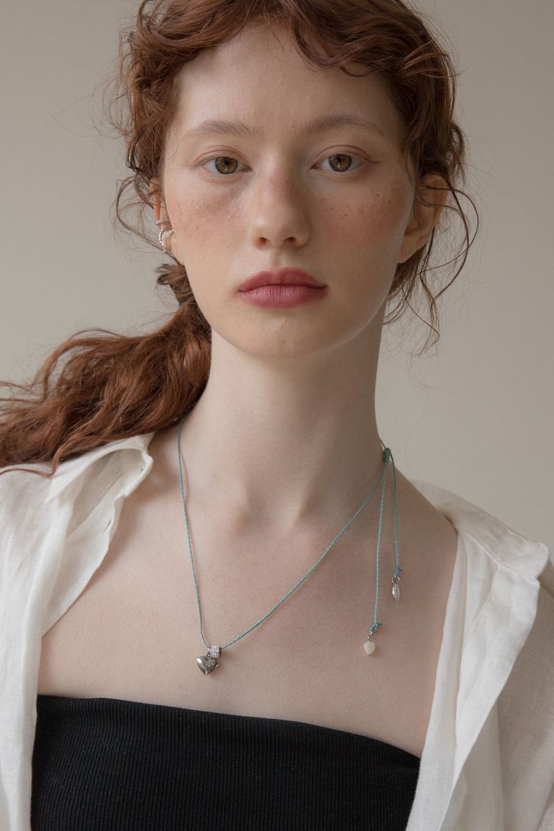 Heart point melange string necklace